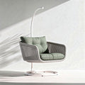 Swing chair with metal base and green cushion 90 x 80 x 100cm